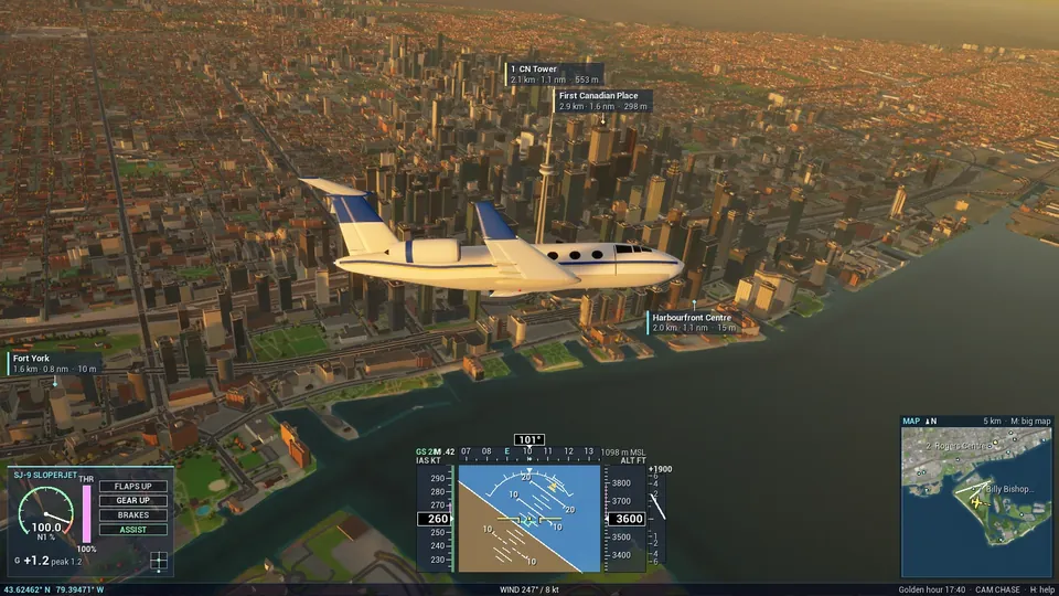 The SJ-9 Sloperjet in a steep bank past the Financial District towers and the CN Tower at golden hour.
