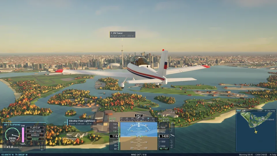 The SW-1 Slopwing over the Toronto Islands on a clear morning, with Billy Bishop airport, the CN Tower and the skyline ahead.